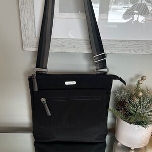 Baggallini Lightweight Nylon Black Go Bag with striped adjustable strap